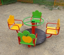 Карусель "Фрукты" для детской площадки с 4-мя сиденьями и рулем  ДВ102